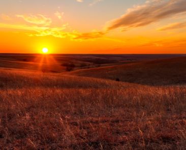 A view of the sunset in the Flint Hills of Kansas just outside of Alma, Kansas