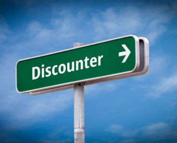 Street Sign the Direction Way to Discounter