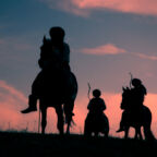 Horsemen riding on the sunset