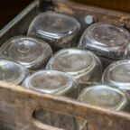 Rustic style wooden box with old fashion glass jars