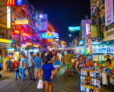 BANGKOK, THAILAND - APRIL 24, 2019: The tourist Khaosan Road is the main all night partying place with numerous bars, shops, hotels and other entertainments for tourists, on April 24 in Bangkok